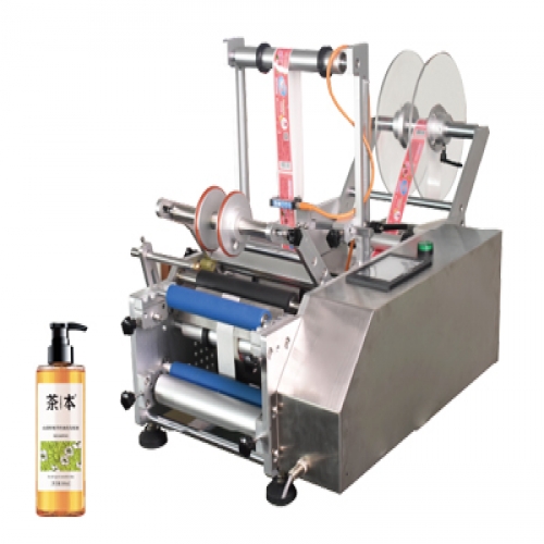 半自動沐浴露圓瓶貼標(biāo)機(jī)